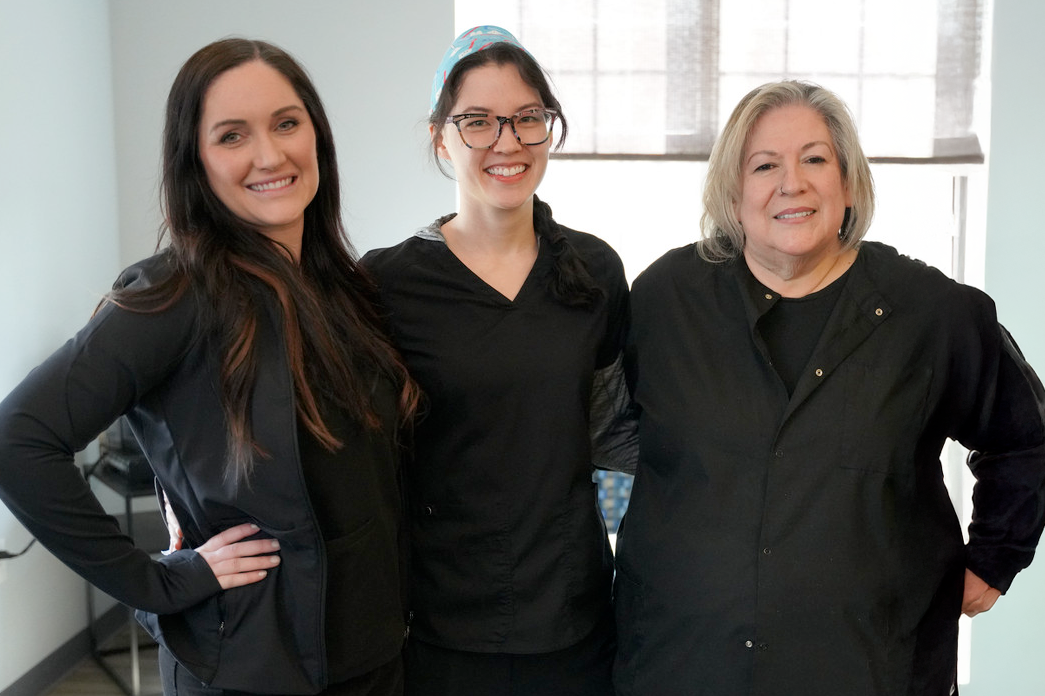 Dental team at The Buffalo Dentist; From left to right: Kiki; Mel; Jane