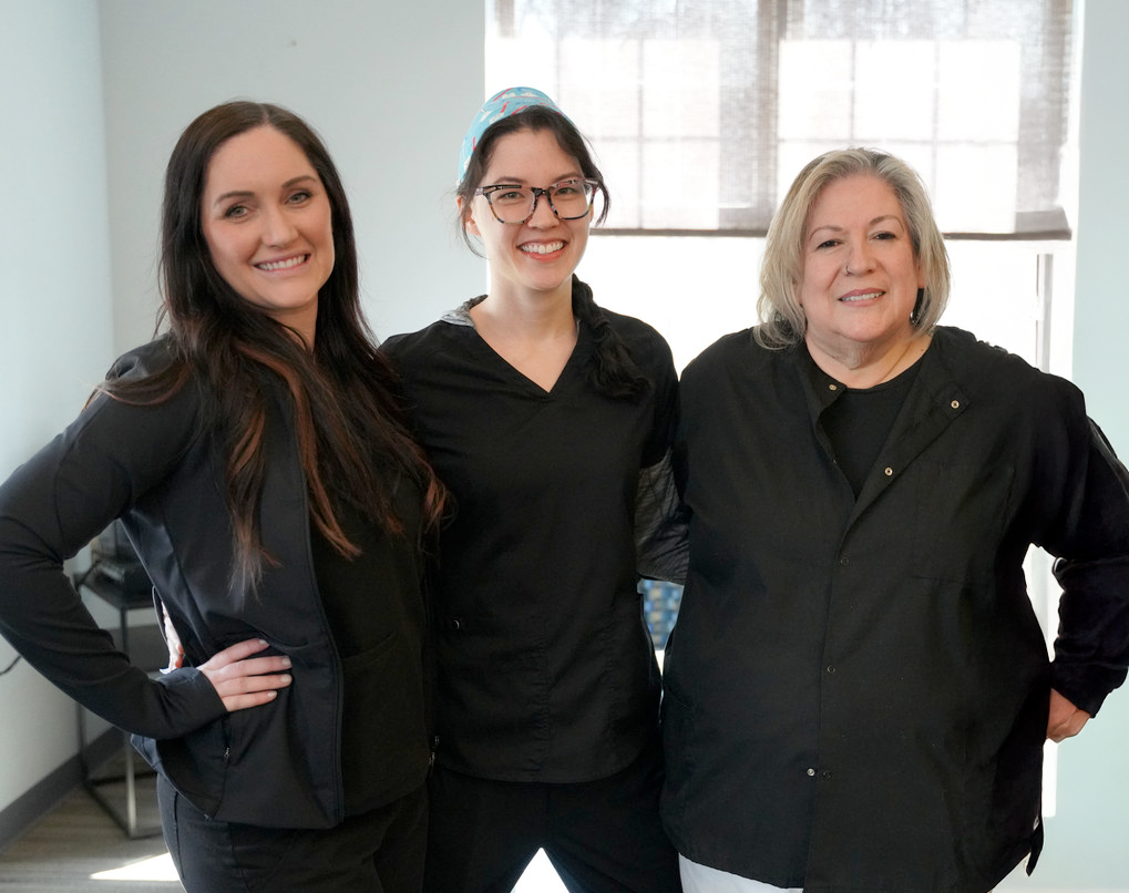 Dental team at The Buffalo Dentist; From left to right: Kiki; Mel; Jane